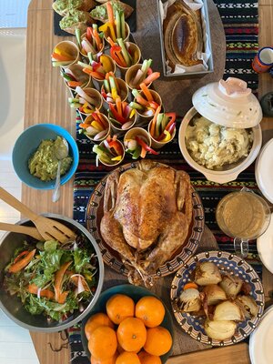 Festive table spread with colorful food – embracing shared meals and cultural celebration